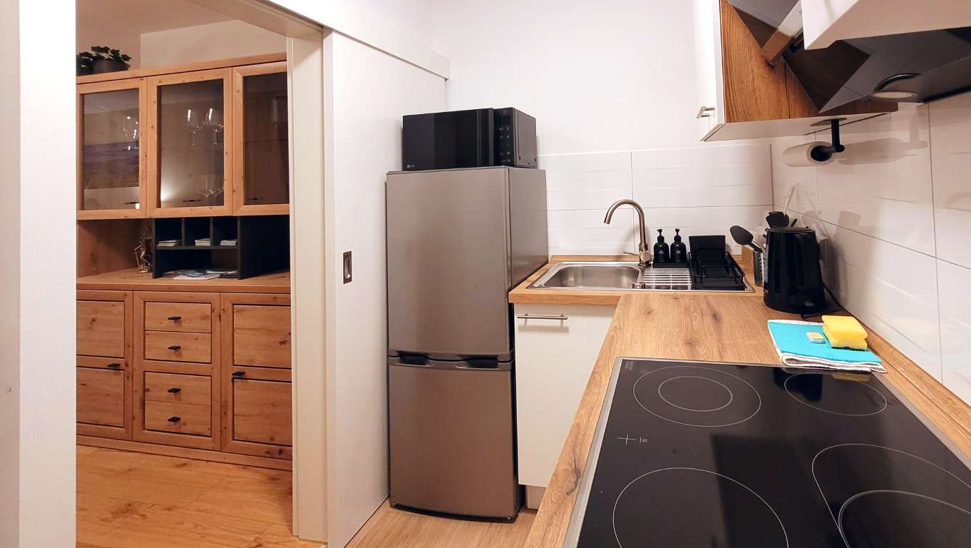 Küche – Ferienwohnung Cosy Prien Apartment