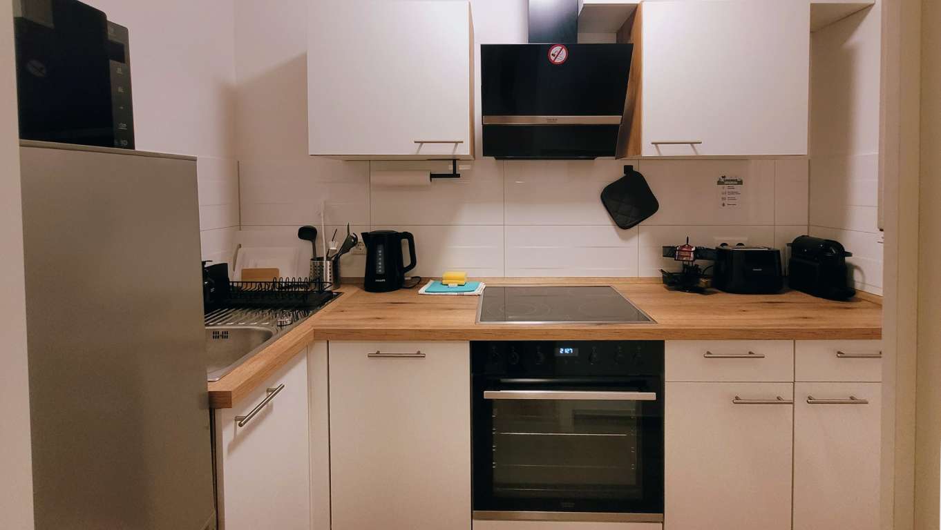 Küche – Ferienwohnung Cosy Prien Apartment