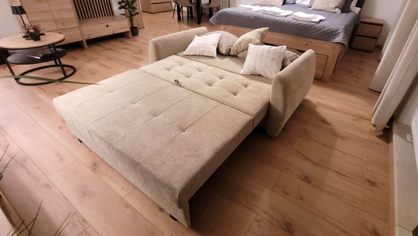 Schlafcouch – Ferienwohnung Cosy Prien Apartment